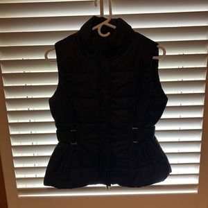A black vest from New York and company size small in good condition